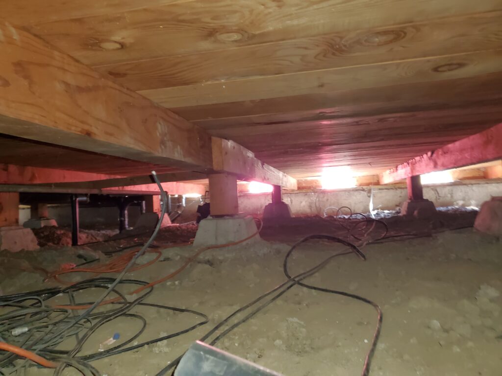 Crawl Space Cleaning & Insulation Replacement in Anne Arundel County, MD before crawl space no vapor barrier exposed wiring maryland