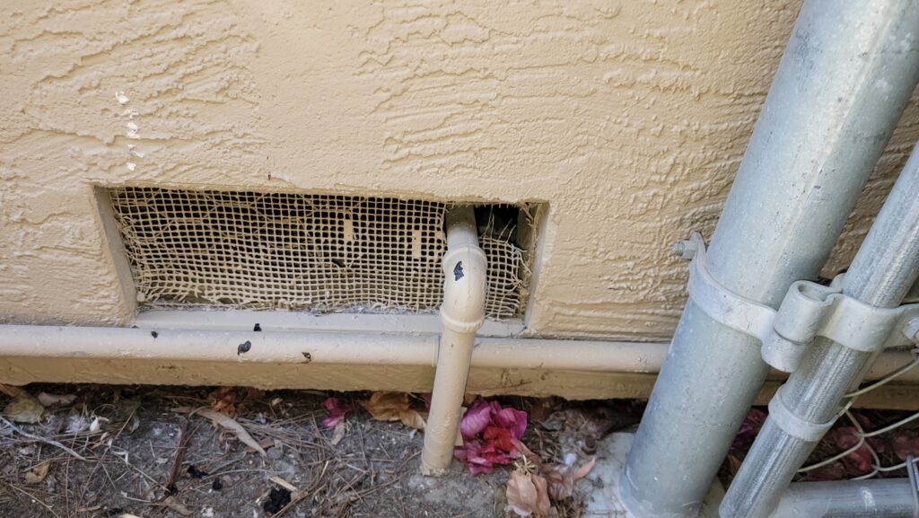 Rodent Proofing in Annapolis, MD — Attics, Crawl Spaces & More damaged crawl space vent rodent entry point maryland.jpg