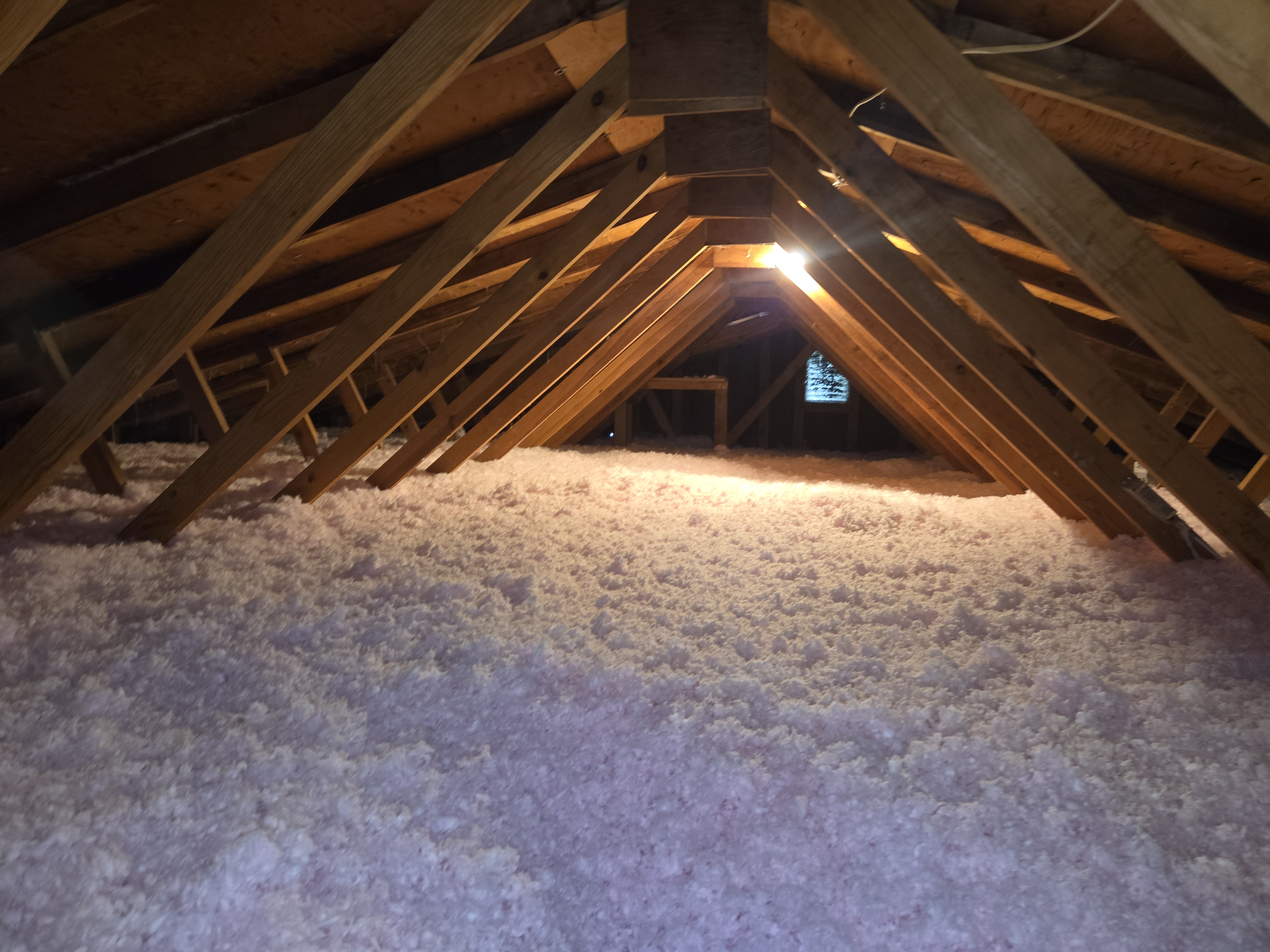 New blown-in fiberglass attic insulation installed by Xanvria in Anne Arundel County, MD